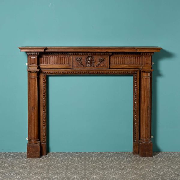 Late 19th Century Georgian Style Carved Oak Fireplace