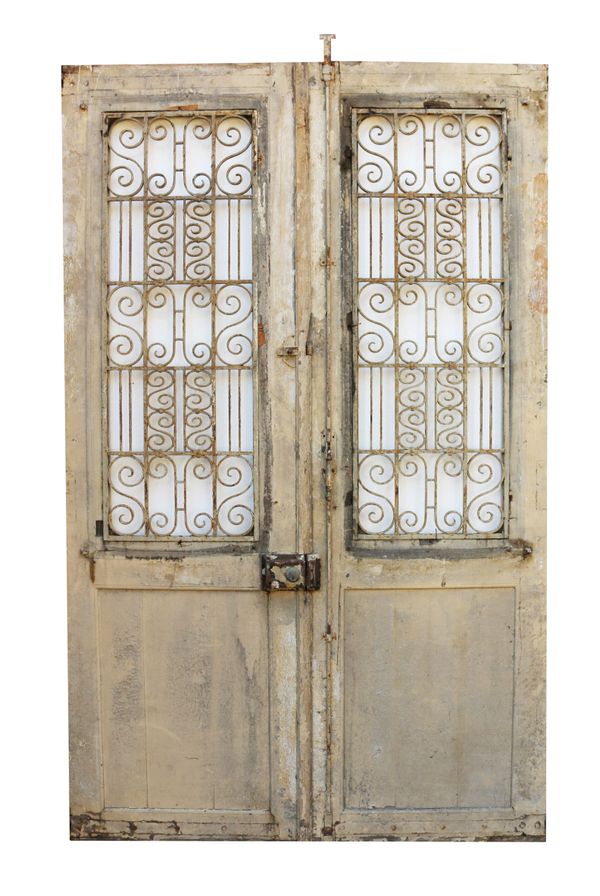 A Set of Antique Exterior Doors with Iron Grills