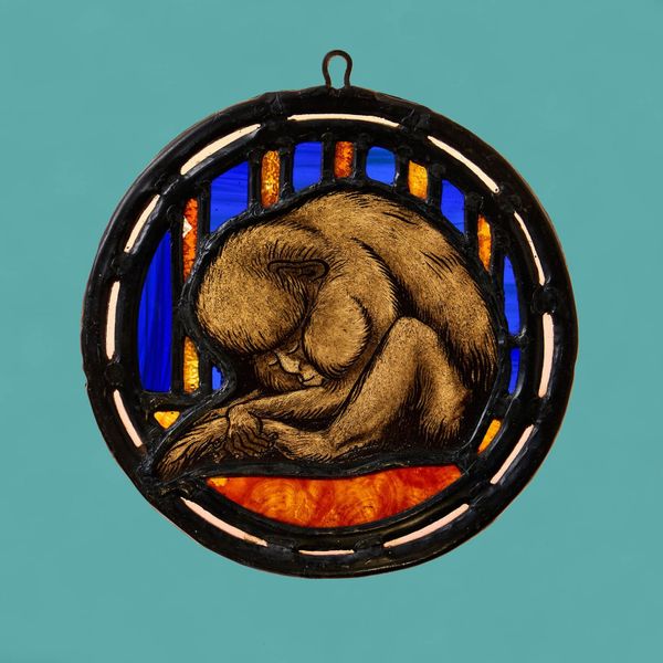 Antique English Stained Glass Roundel Depicting a Sleeping Monkey