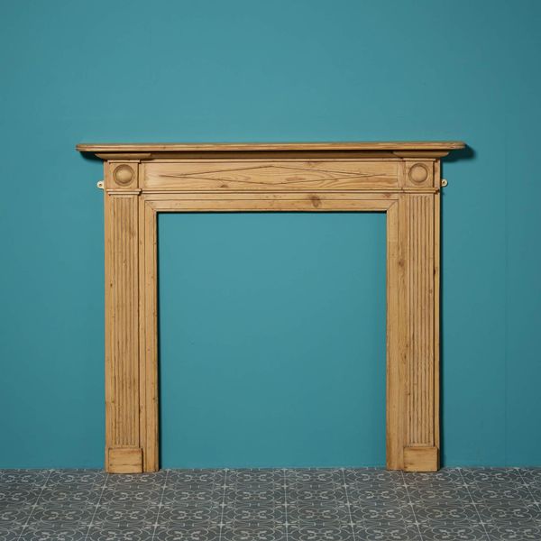Antique Georgian Waxed Pine Bullseye Fireplace