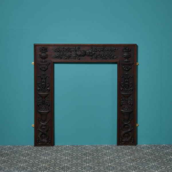 Antique English Neoclassical Style Carved Oak Fireplace