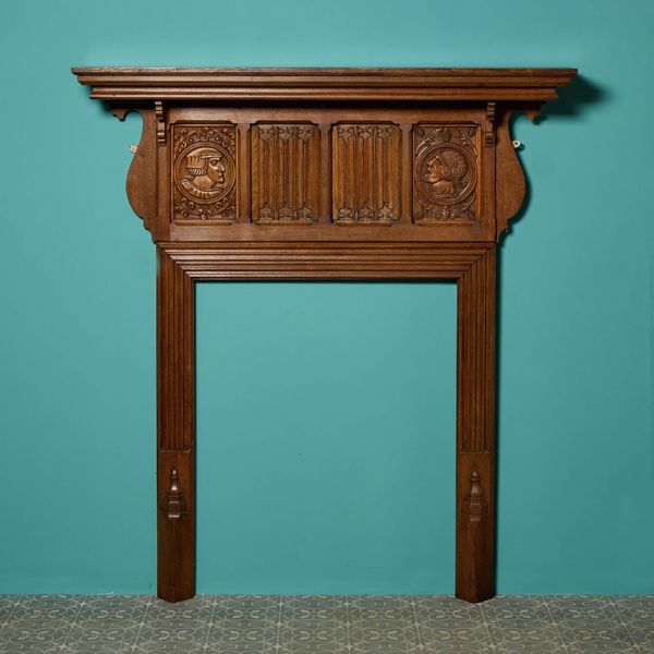 Antique Jacobean Revival Carved Oak Fireplace