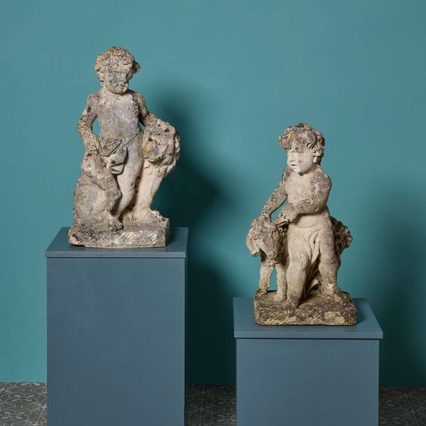 Pair of Antique Limestone Putti Statues with Sheep & Lion