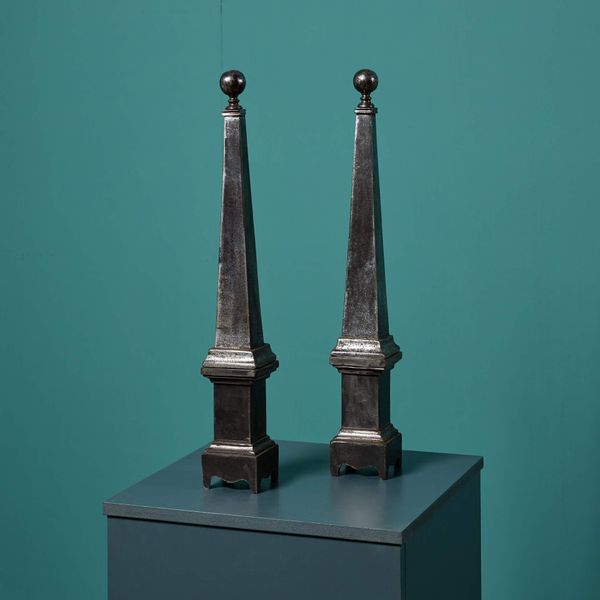 Pair of Polished Cast Iron Obelisks