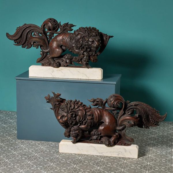 Two Mounted Antique Carved Wooden Lion Sculptures