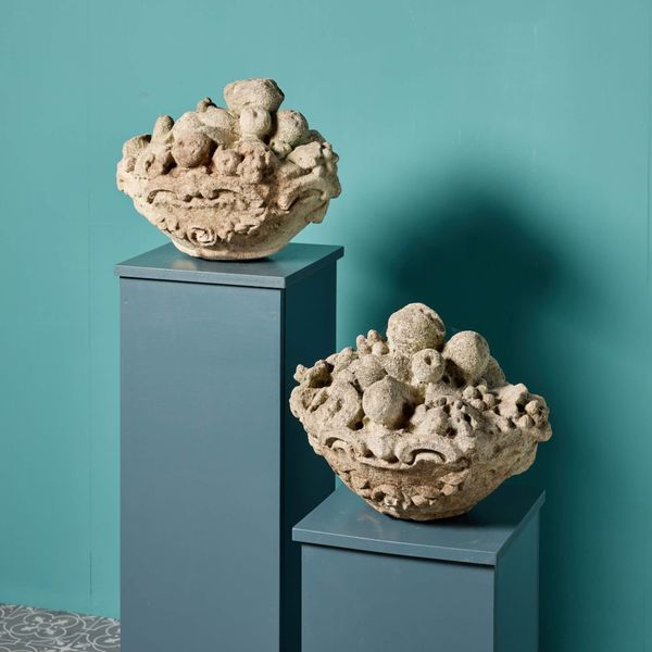 A Pair of Antique Carved Limestone Basket of Fruit Finials