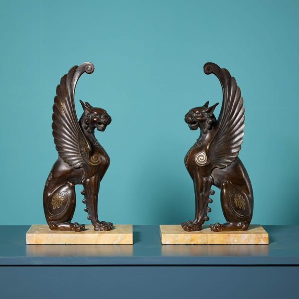 Pair of 19th Century Bronze Winged Lion Sculptures on Marble Bases
