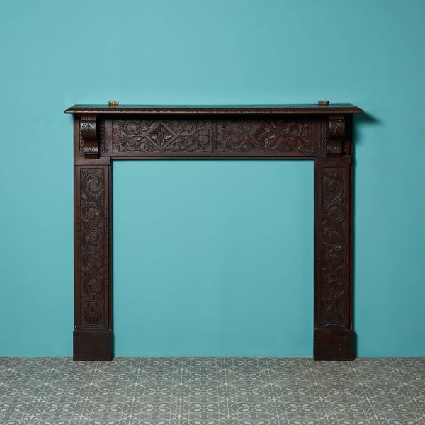 Antique 19th century Tudor Style Carved Oak Fireplace